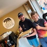 Rob Robinson, owner of Brew Bear Coffee House, with Thomas Harrison, owner of Thomas Makes Bakes.