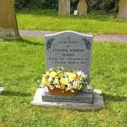 The plastic flowers on Lynda Annis' mothers grave. 