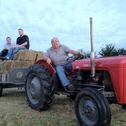 TRACTOR: Darren Eden’s father Dave, front, with Dan Smart, middle, and Darren Emery.