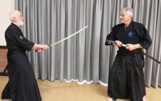 Barry Jones (L) and Luigi Pasqualin (R) achieved a black belt in Japanese sword art